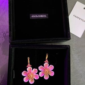 Dolce earrings never worn